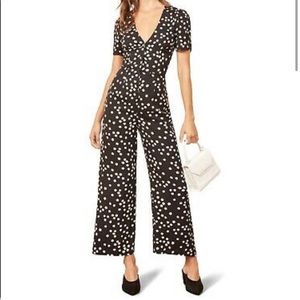 REFORMATION BLACK JUMPER WHITE FLOWERS. PRACTICALLY NEW, worn once. SIZE 2